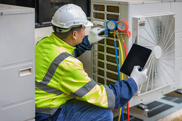 Professional Heat Pump Repair technician working in Washington, MI